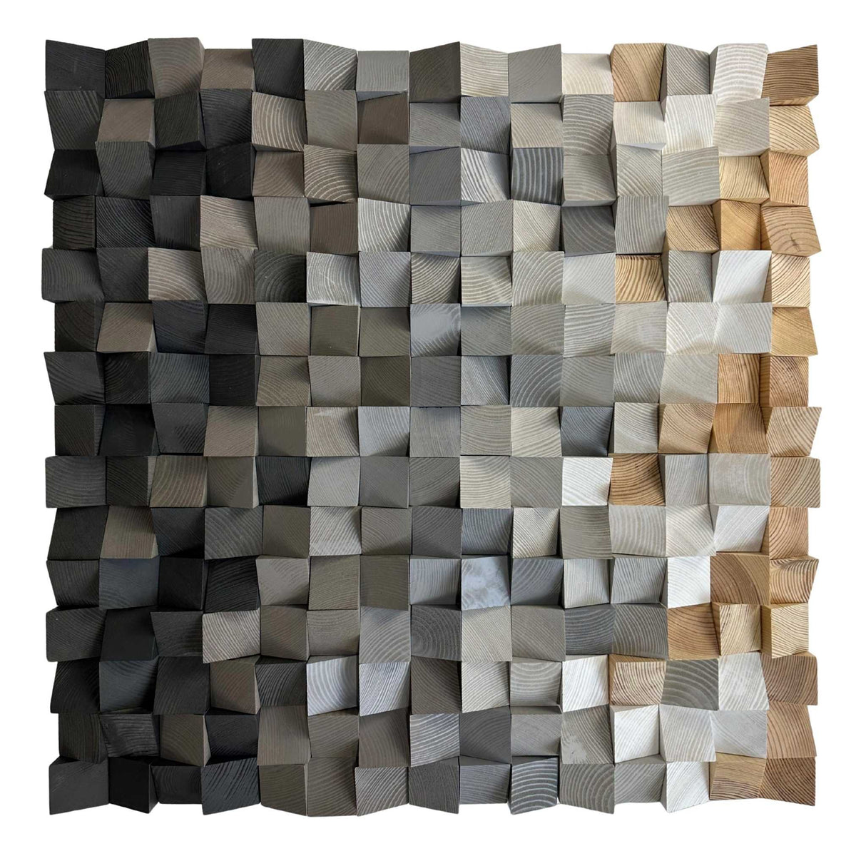 A square wooden wall art piece made of many small cuboid blocks arranged in a grid, showing a gradient from dark charcoal and gray wood tones on the left to light beige and natural wood tones on the right, photographed against a plain white background.